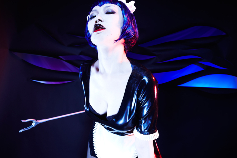 Illustration for article titled Controversial Game Brought to Life With Tight Rubber, a Nice Lady and Fake Blood